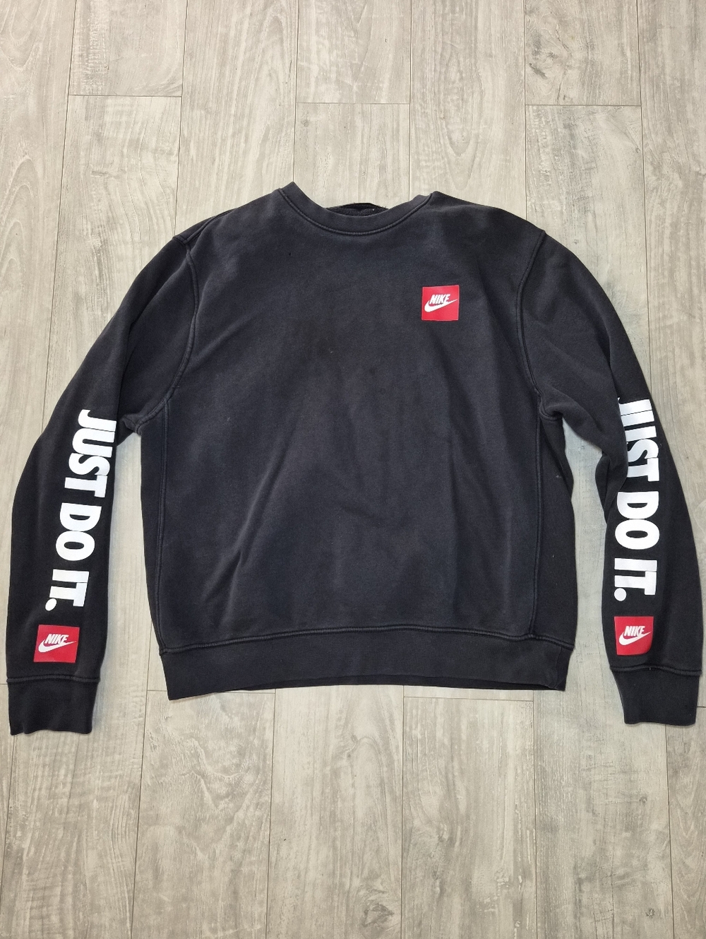 Nike Men’s Black Crewneck Sweatshirt with Red Logo Accents